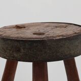 Brutalist French solid oak tripod stool with metal rim, 1850s