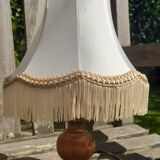 bedside lamp, small turned wooden foot and ecru pagoda lampshade with stripe and fringes