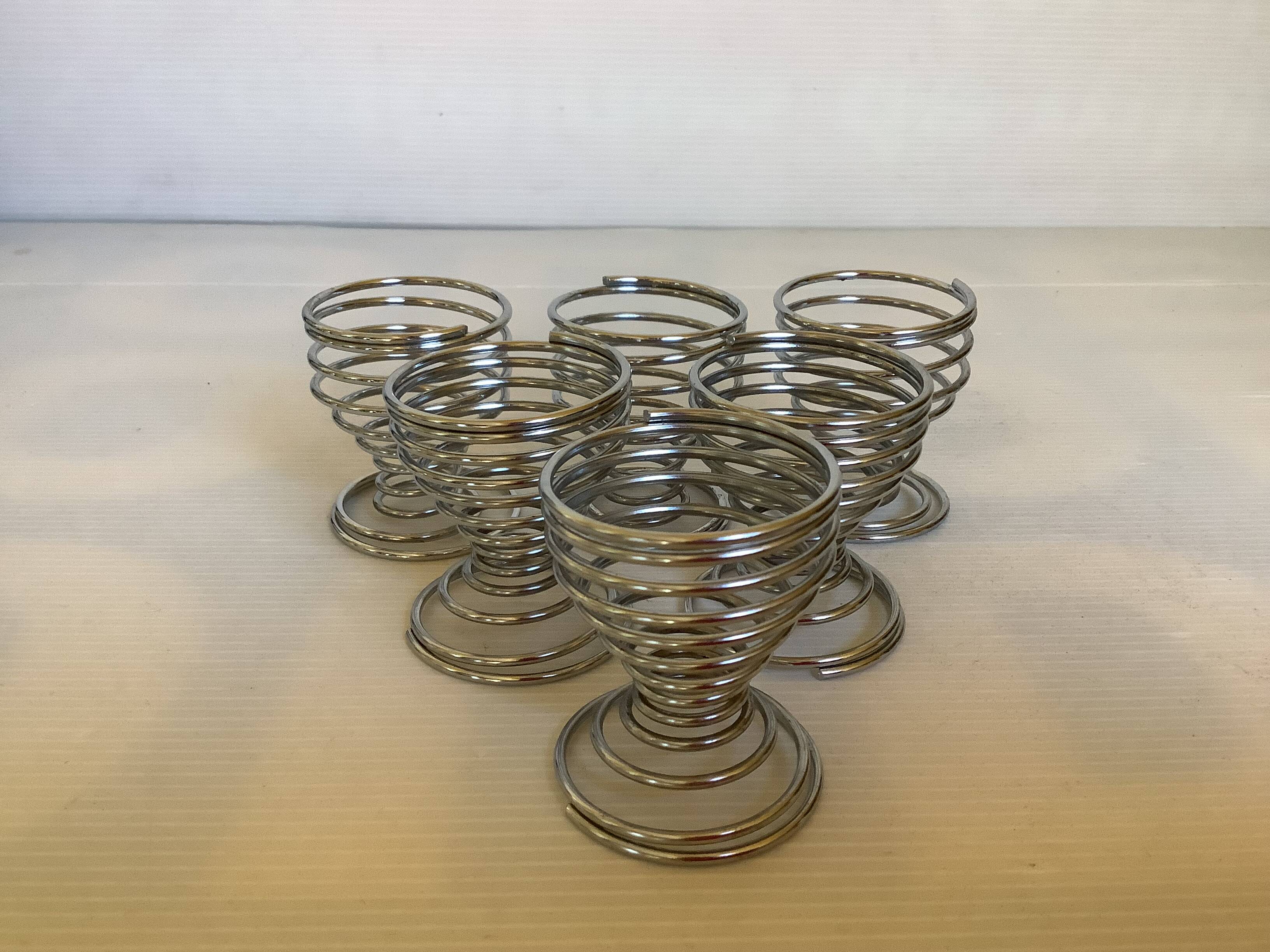 Six spiral spring egg cups