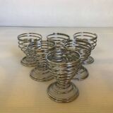 Six spiral spring egg cups