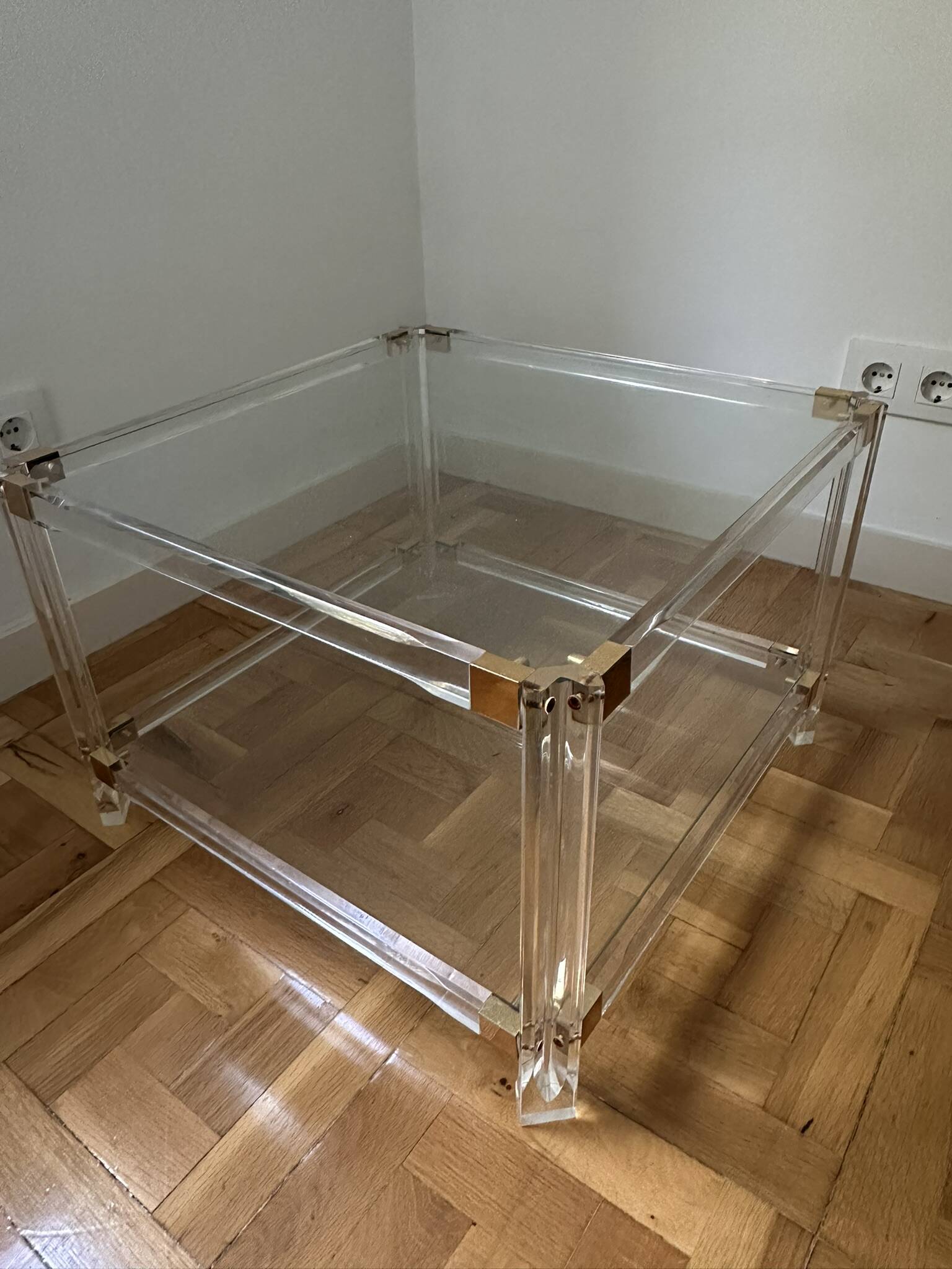 2 side tables in plexiglass, glass, and brass.