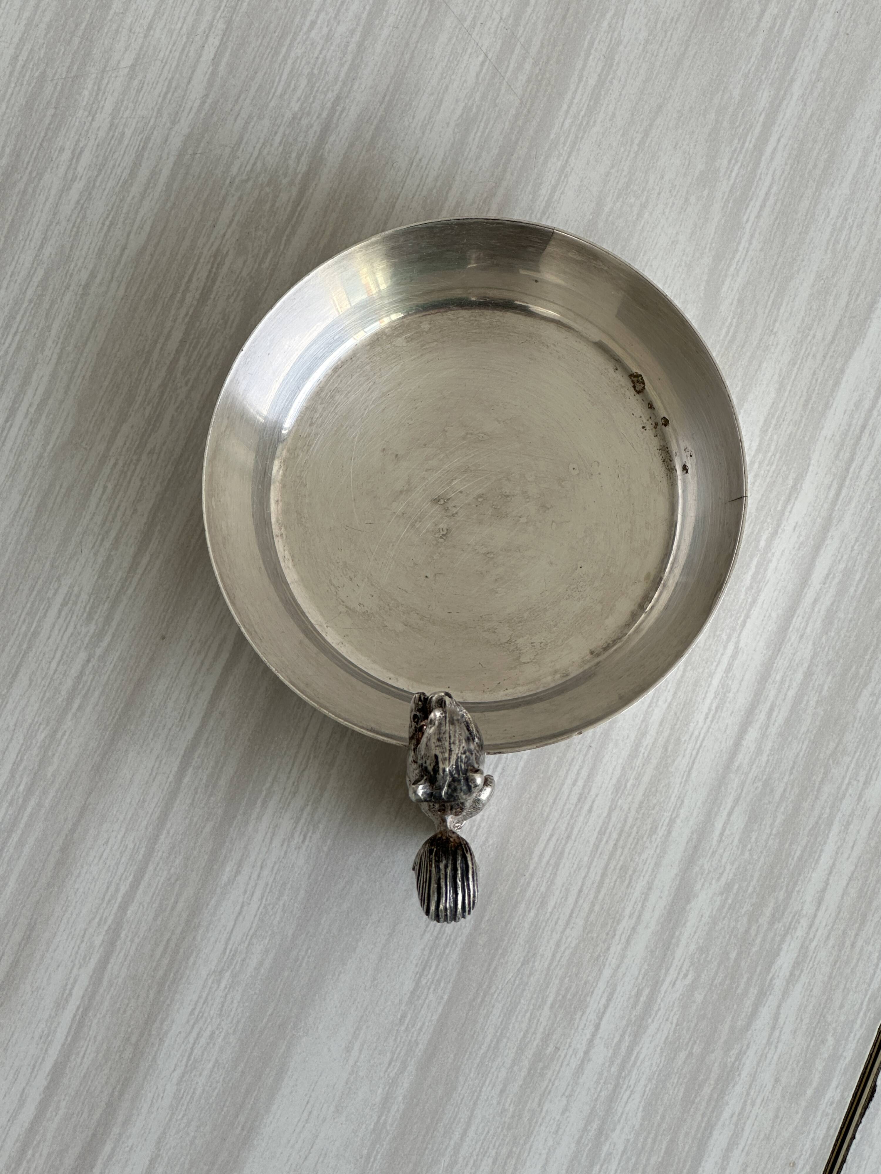 Metal cup with squirrel