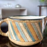 Antique milk jug.