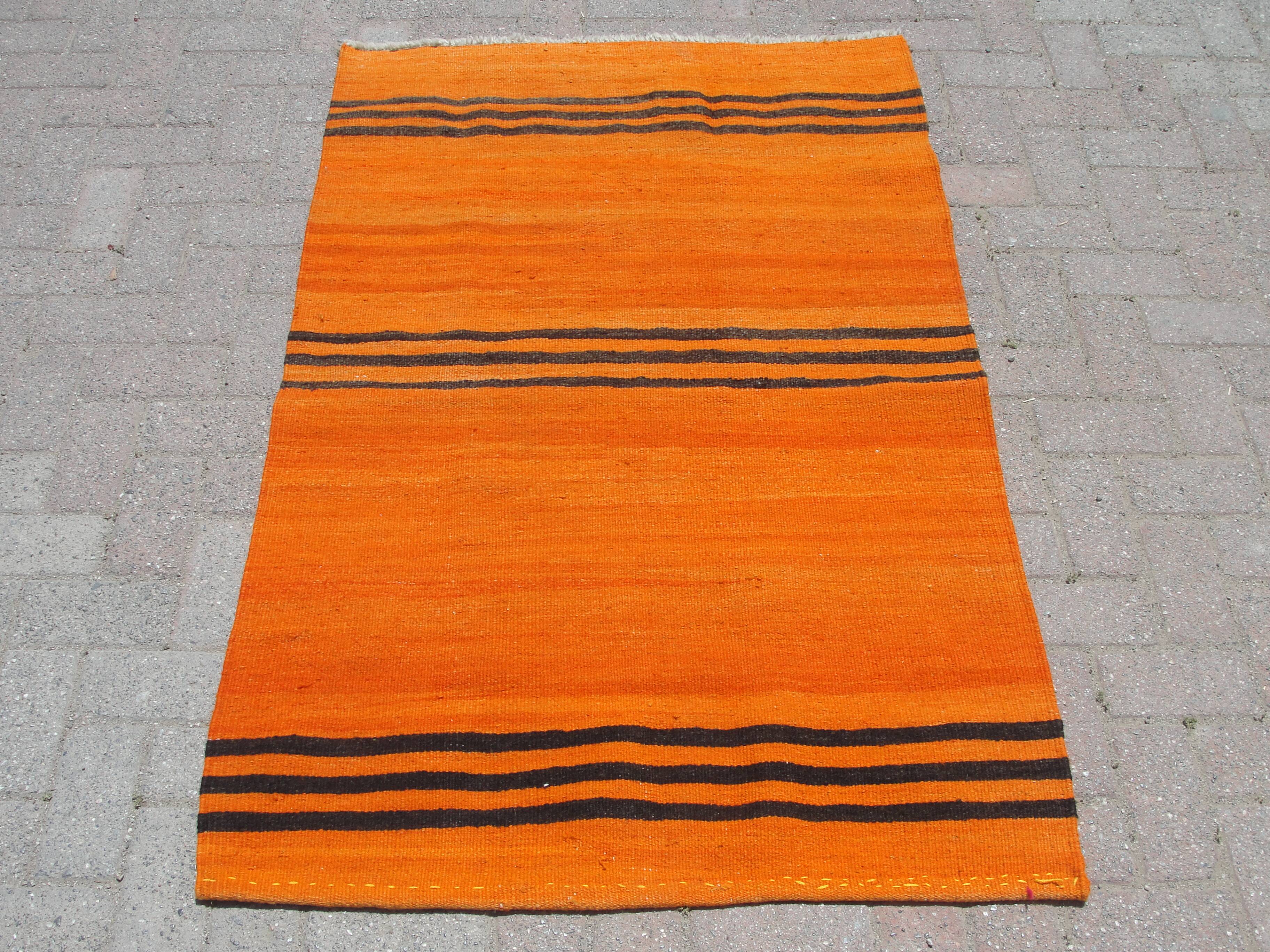 Orange handmade small rugs