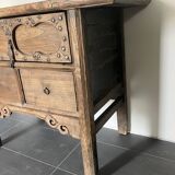 Very old elm wood with carved patterns and ironwork pieces.