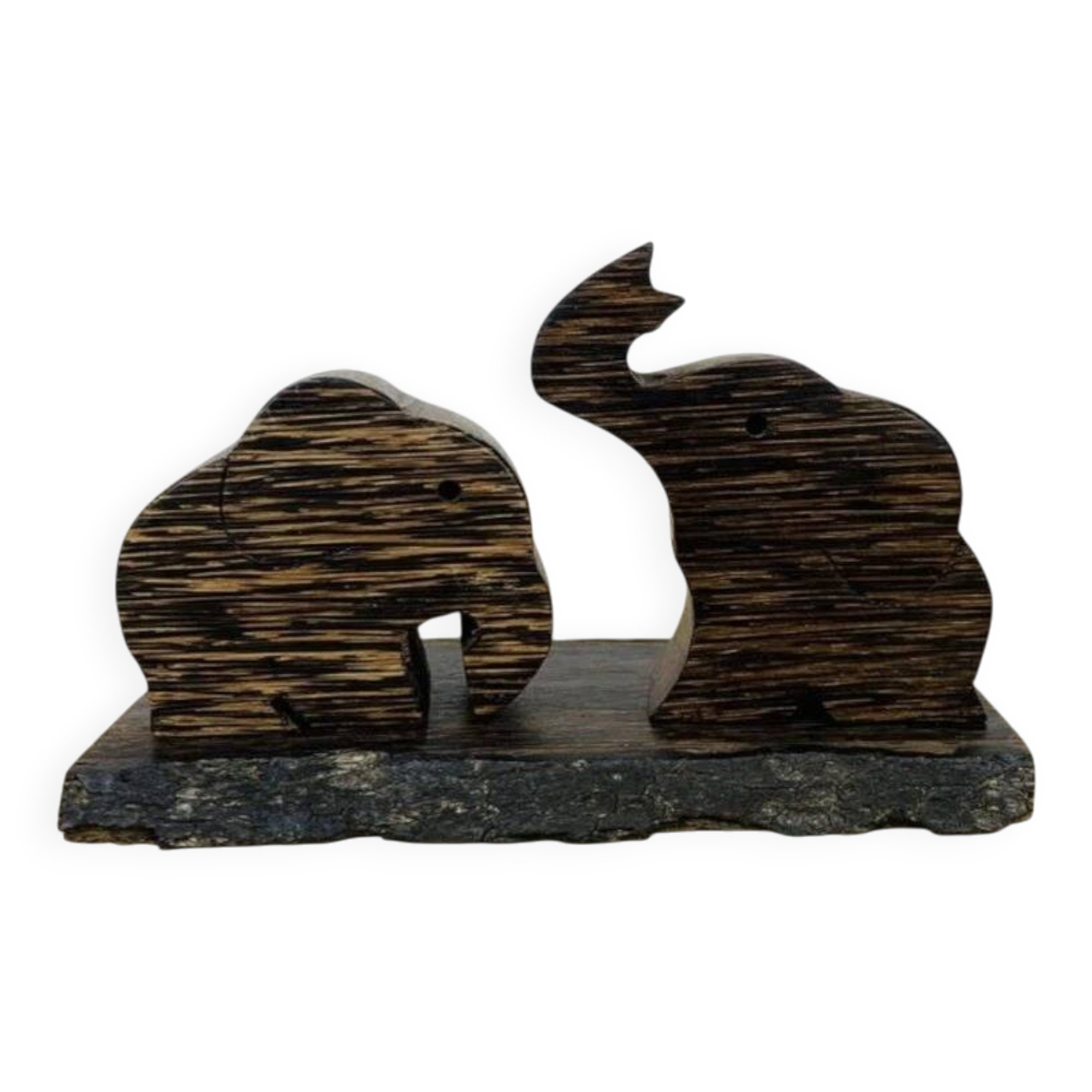 Vintage palm wood elephant salt and pepper shakers.