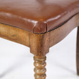 Set of eight late empire chairs in high quality brown leather in mahogany