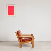 Brutalist armchair in oak and leather by Tage Poulsen, Denmark, 1970s.
