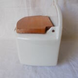 Saltbox in earthenware flowers cover wood