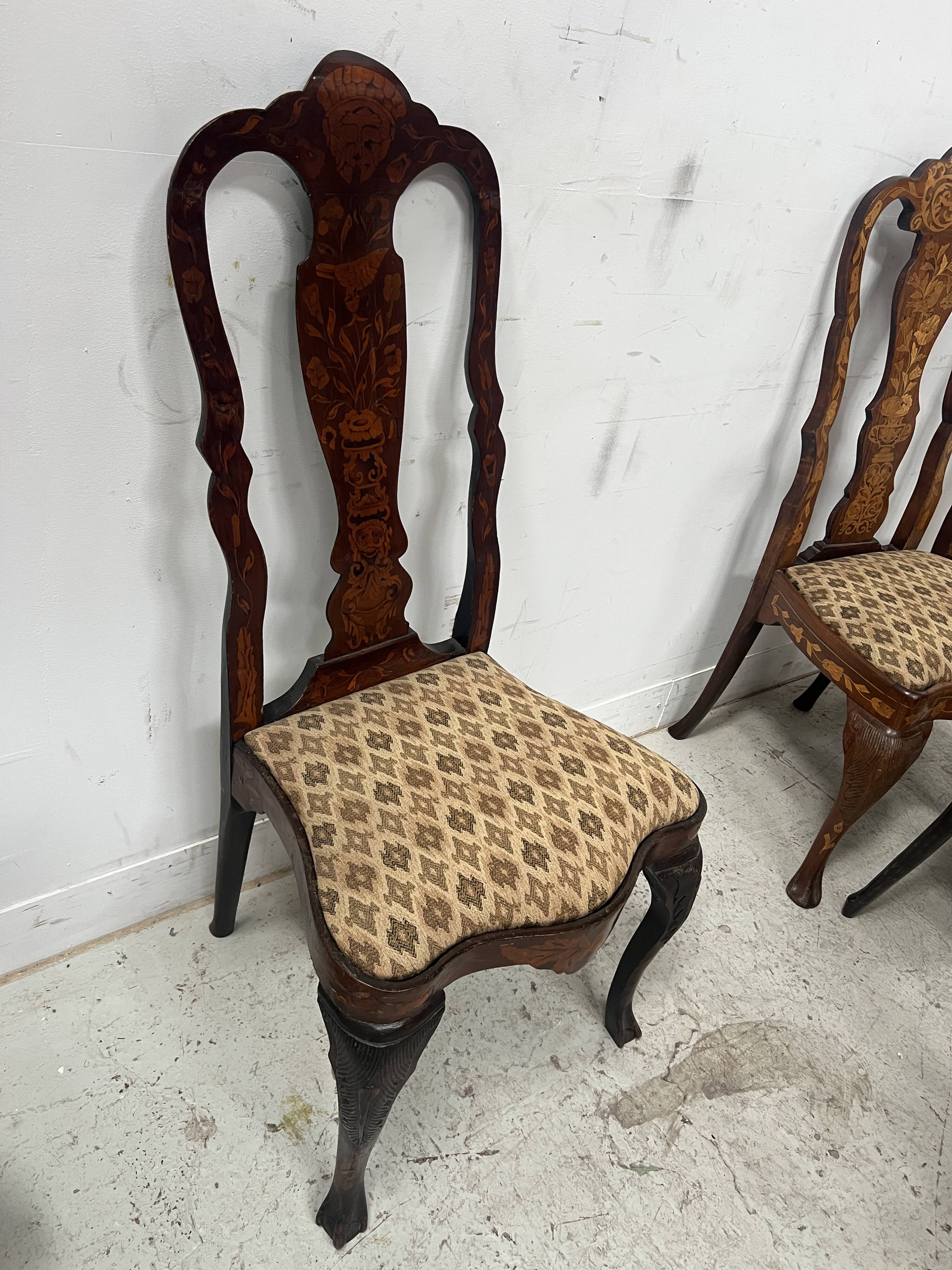 Set of eight Dutch marquetry chairs from the 19th century.
