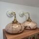 Pair of wall sconces in marbled opaline.