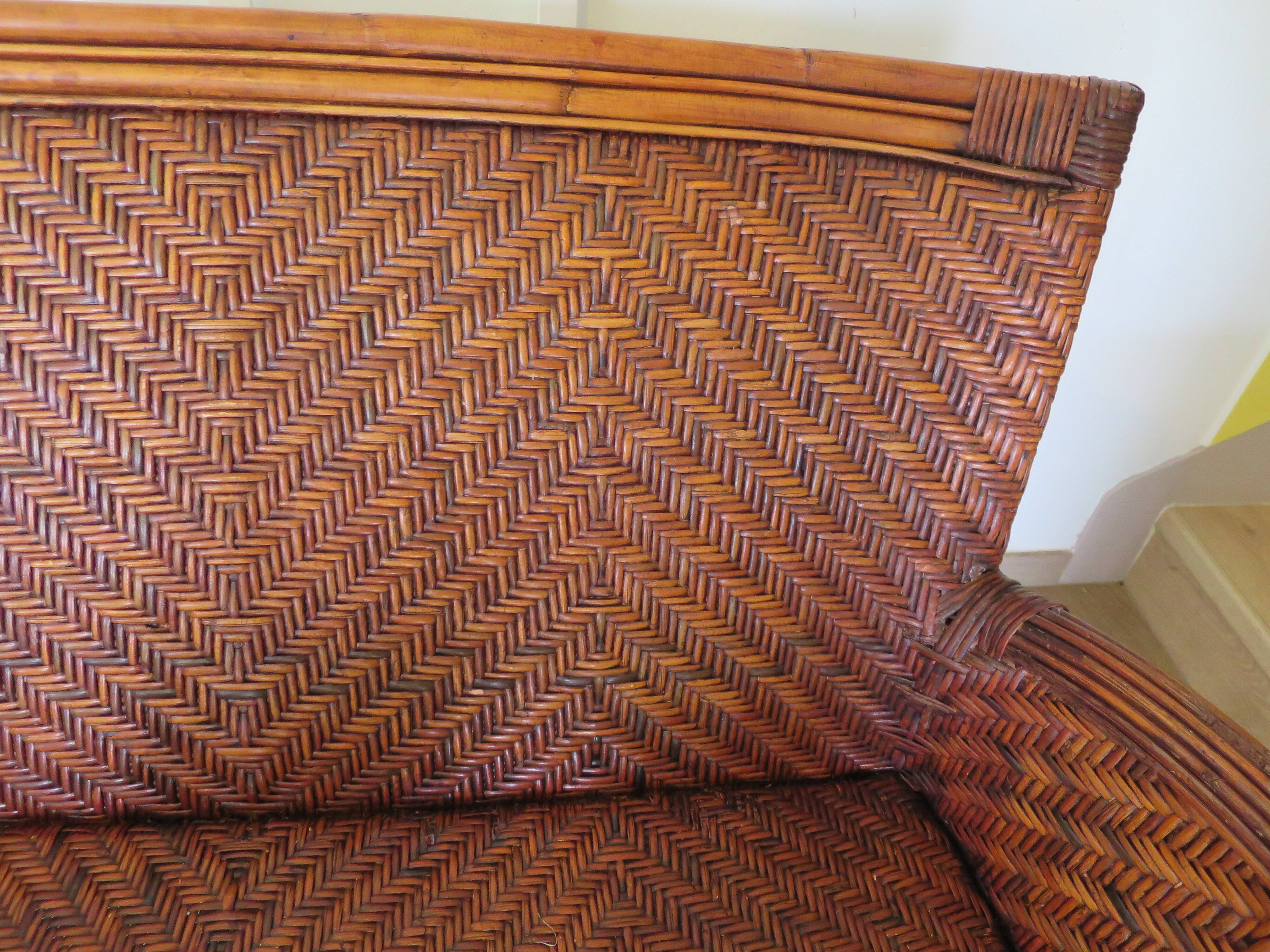 Two-seater banquette in woven rattan, wood and bamboo, 1980s.