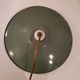Old suspension in green enamelled sheet metal and porcelain socket to hang