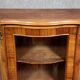 Louis XV style curved glass-fronted bookcase in rosewood
