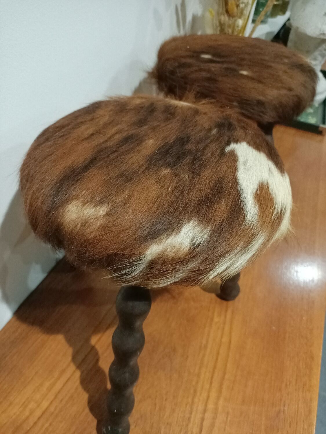 Duo of cowhide stools