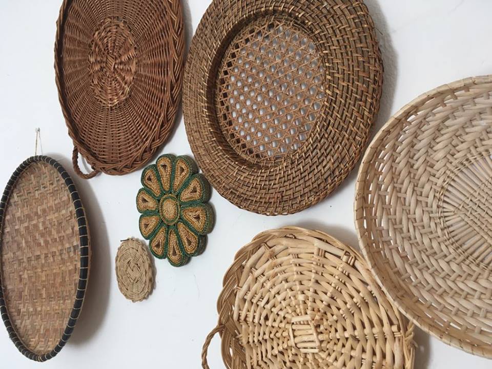 Wall composition of baskets and braided wicker trays