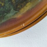 Set of 4 flamed enamel plates in green and amber from the 60s-70s.