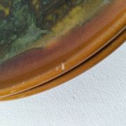 Set of 4 flamed enamel plates in green and amber from the 60s-70s.