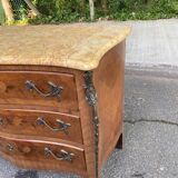 Curved Louis XV chest of drawers in marquetry and beige marble