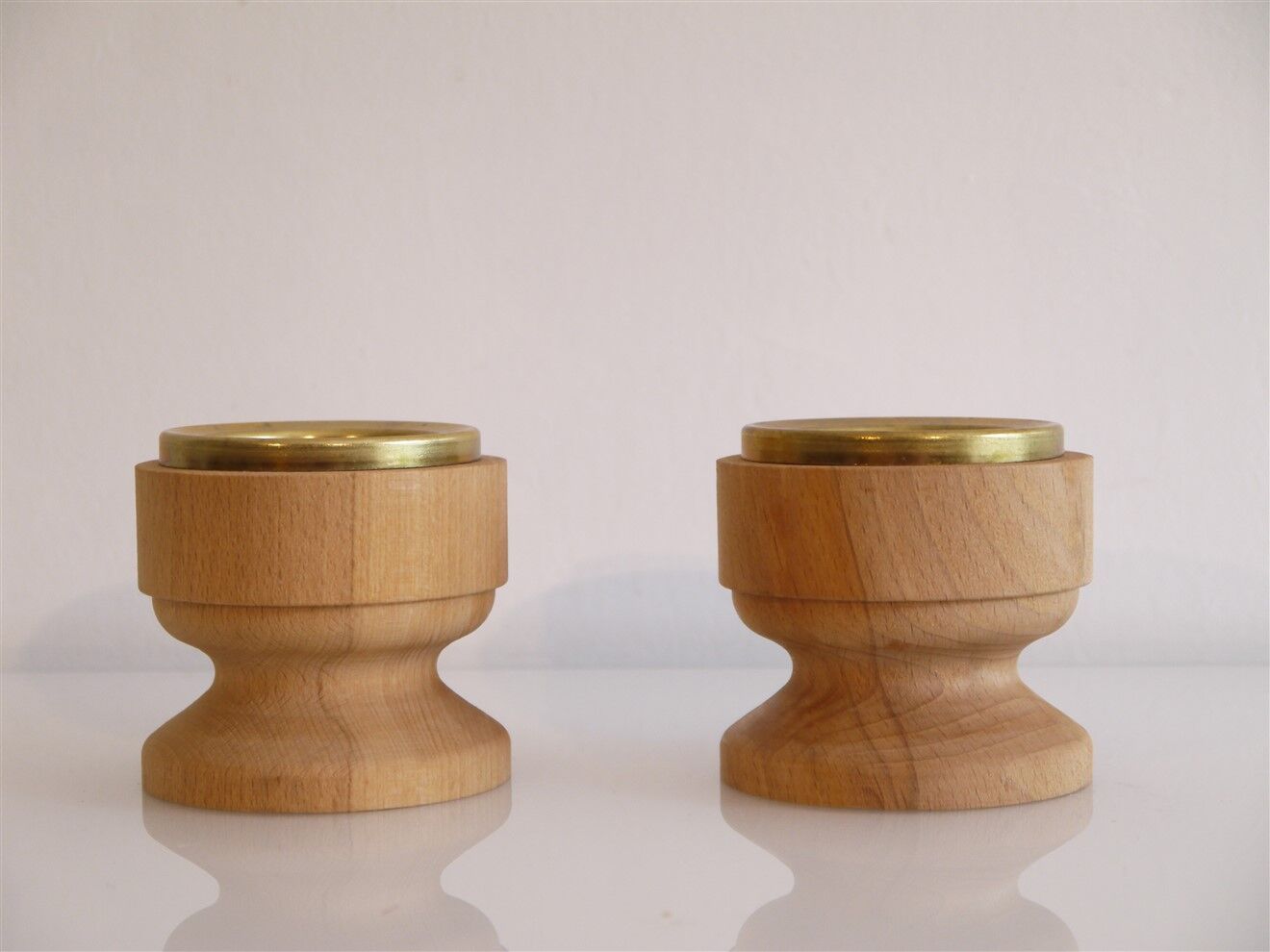 Pair of vintage candle holders in wood and brass