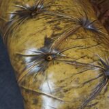 Patinated Chesterfield armchair