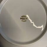 Vintage table service Limoges porcelain white with gold trim.