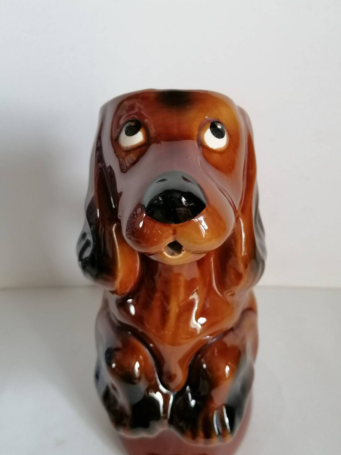 Zoomorphic dachshund dog pitcher in majolica slip
