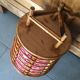Rattan-work basket with vintage fabric