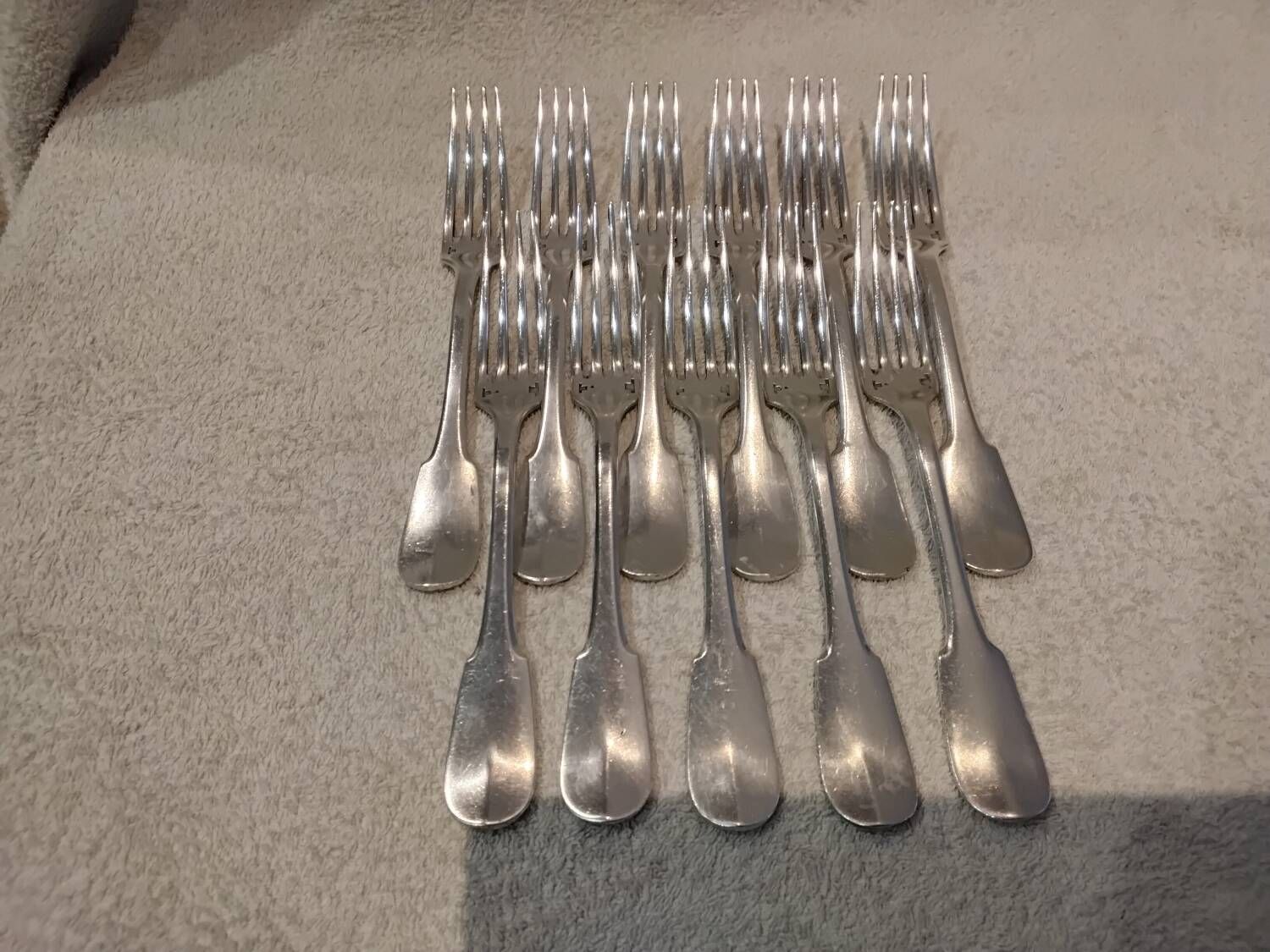 11 silver-plated table forks by Christofle Cluny with stripes