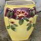 Yellow glazed ceramic slip vase with hawthorn pink flower motif