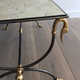 Coffee table in brushed steel and brass