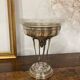 Art Deco silver metal cut on foot