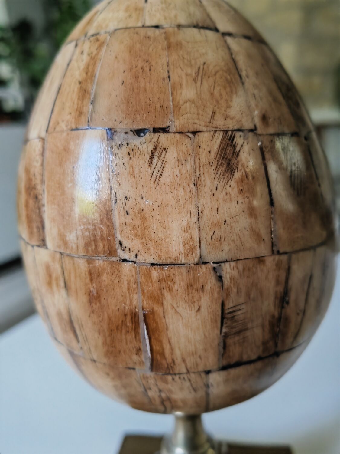 Horn and brass egg