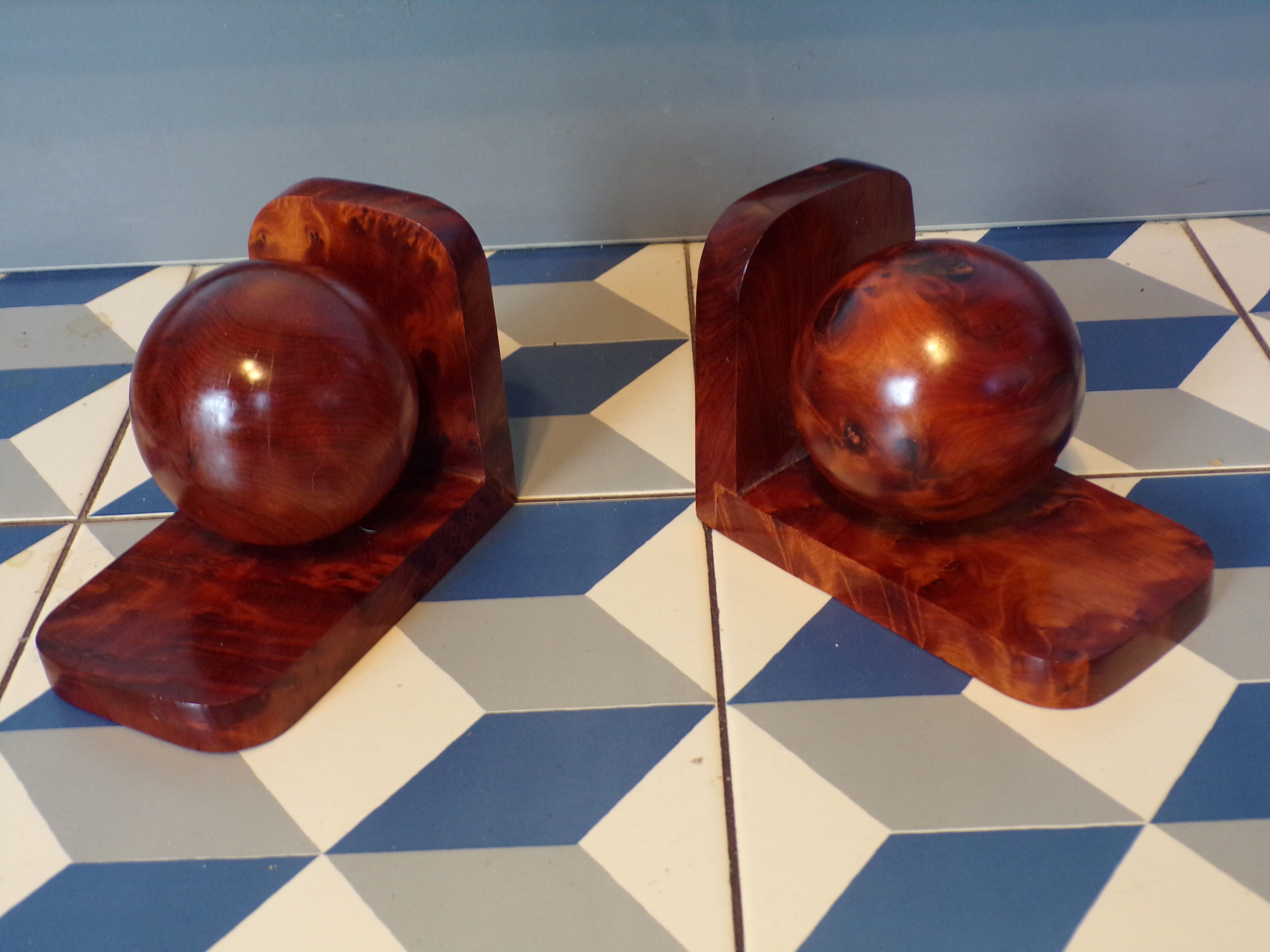 Pair of art deco bookends in thuya magnifying glass