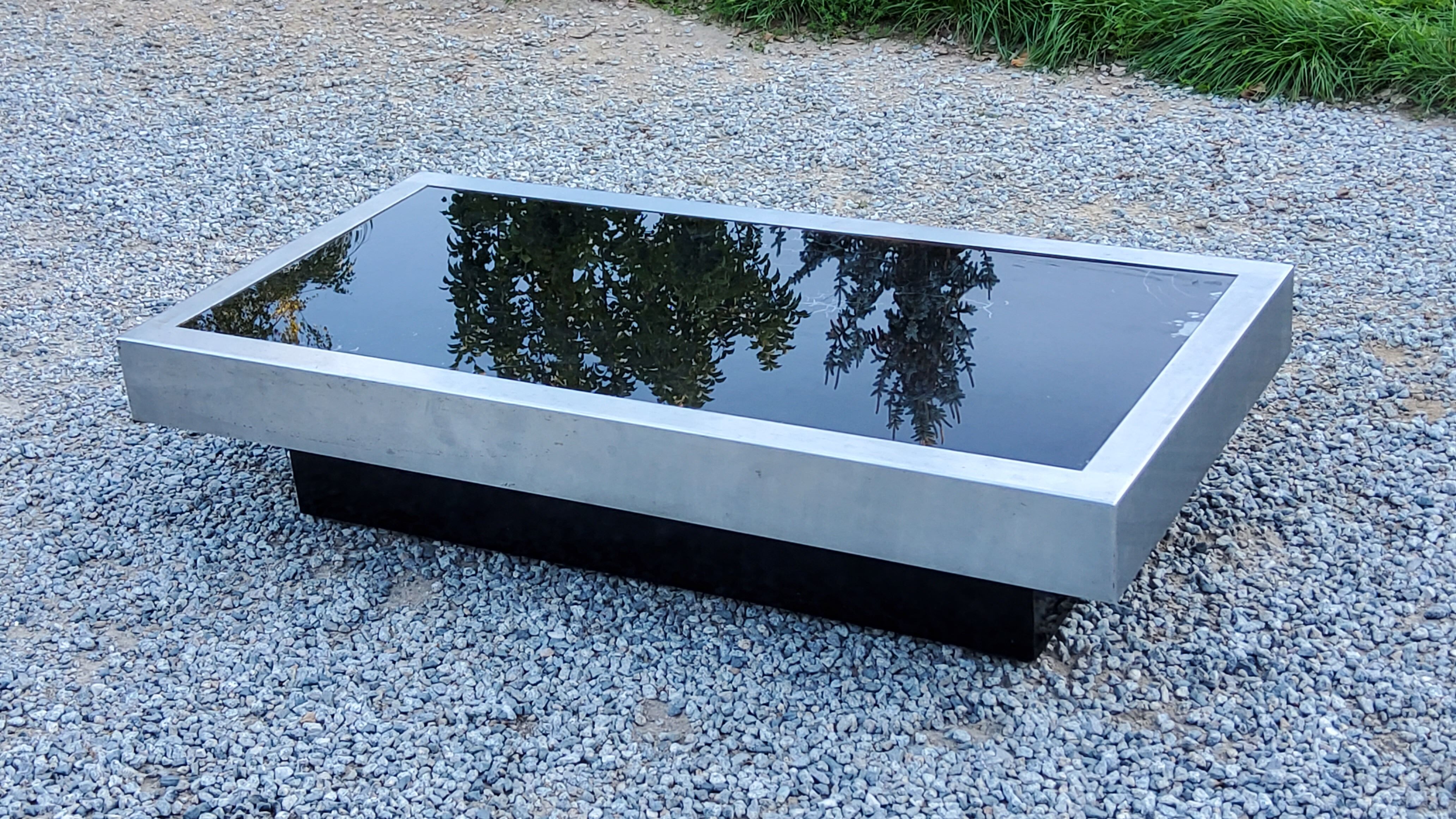 Coffee table in brushed steel and black tinted glass from the 70s