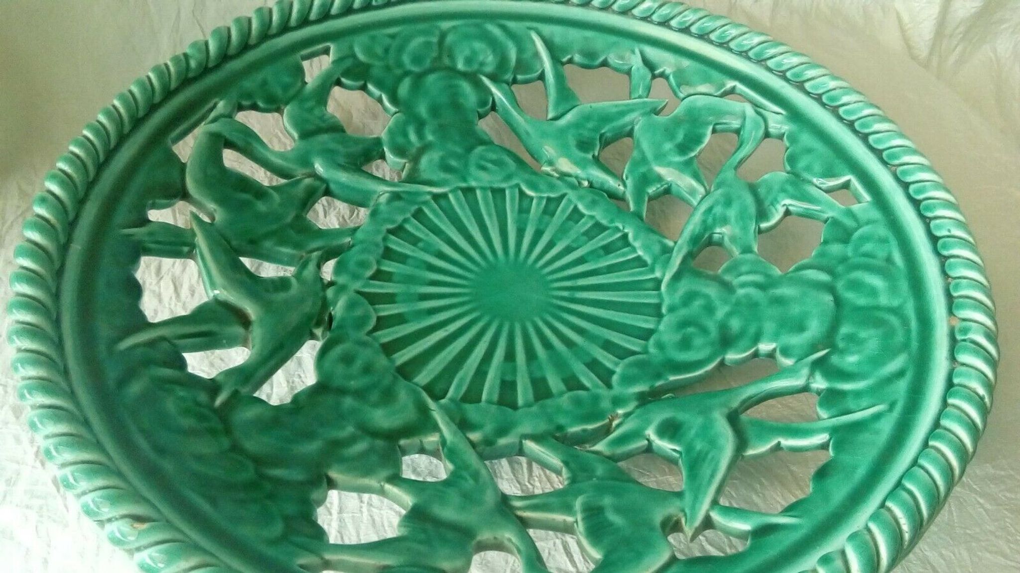 Twisted and pierced ceramic fruit bowl with a duck motif from the 1950s.