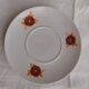 Vintage orange patterned cup and saucer