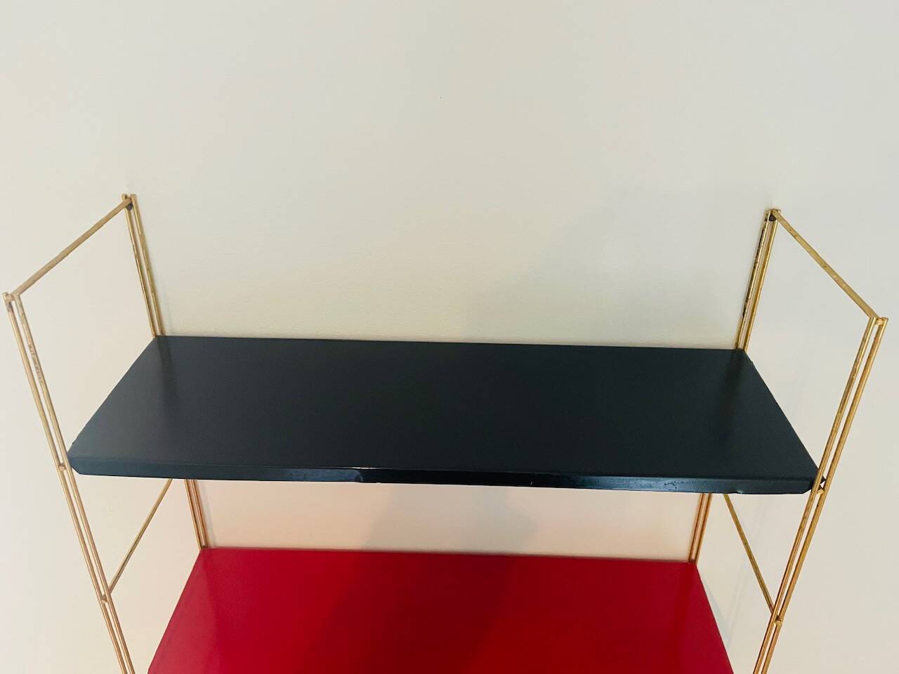 Modular vintage wall shelf, black and red metal circa 1960s