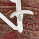Antique wall-mounted coat rack