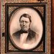 Black and gilded ebonite frame, wood and plaster 19th century