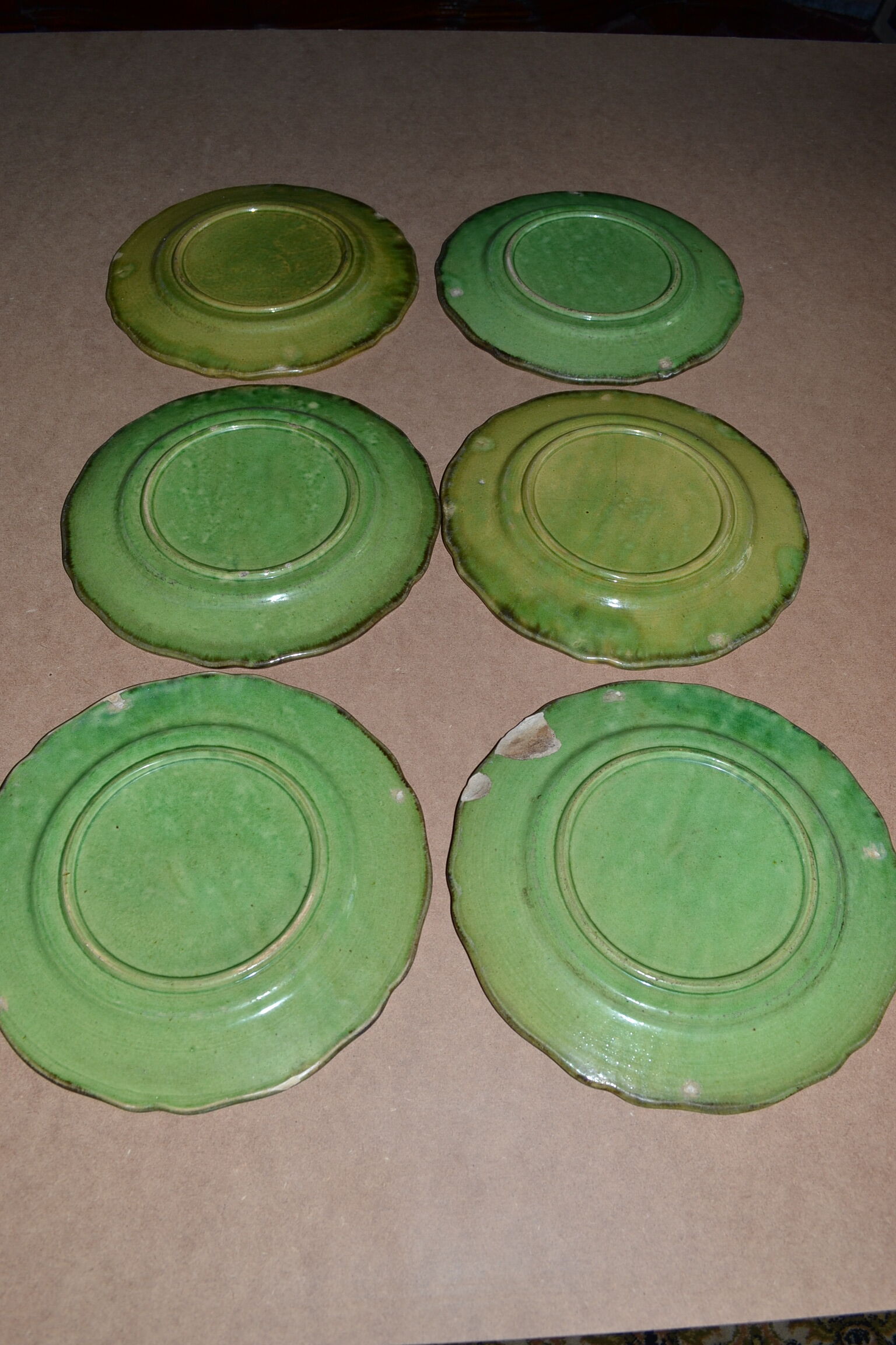 Series of 6 plates in earthenware with green glaze, Provence, France, end of the XIX th century