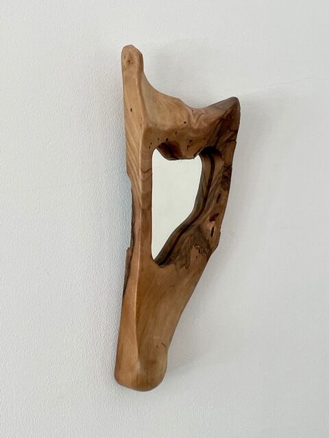 Brutalist mirror made of olive wood