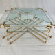 Coffee table and its 4 associated nesting tables in plexiglass and gold metal