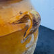 Old yellow glazed terracotta grease pot south west France