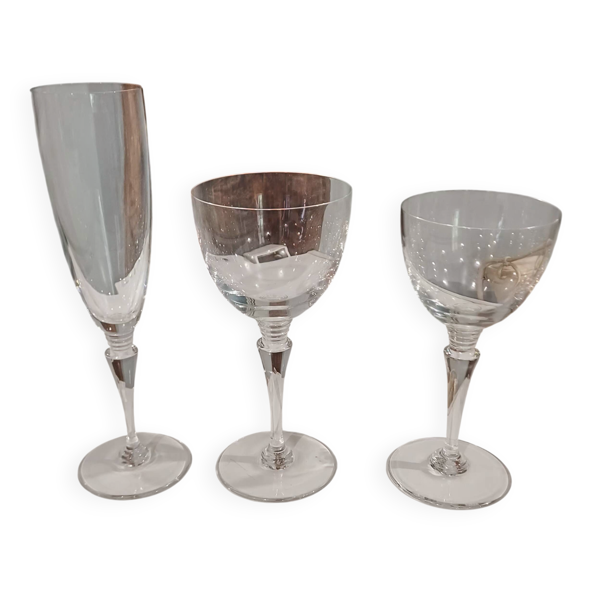 Set of St Louis glasses including 10 flutes, 12 wine glasses, and 12 water glasses.
