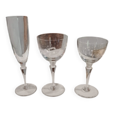 Set of St Louis glasses including 10 flutes, 12 wine glasses, and 12 water glasses.