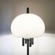 Italian space-style floor lamp from the 1960s with a stone base.