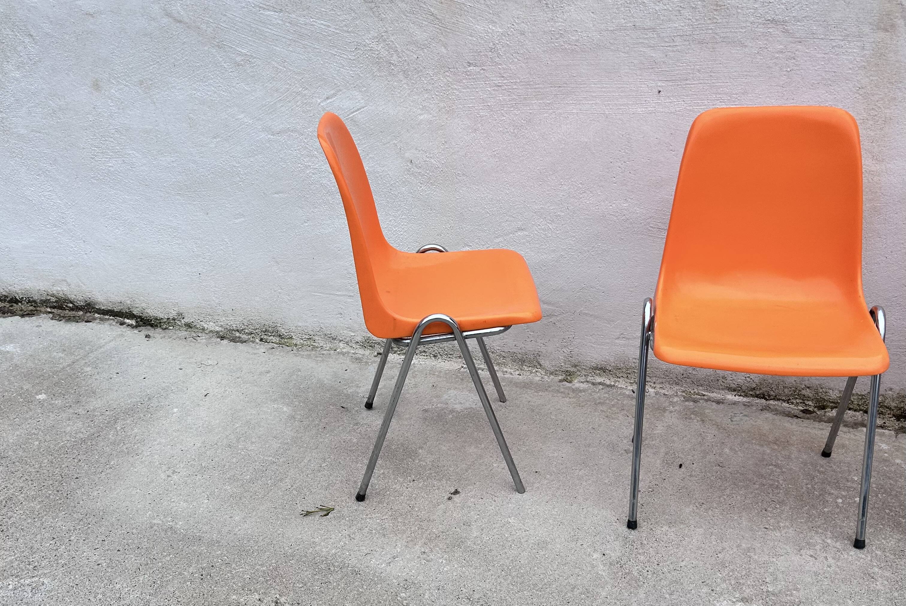 Orange plastic chairs