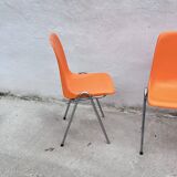Orange plastic chairs