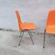 Orange plastic chairs